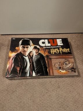 Hasbro CLUE Harry Potter Board Game - Black, Red, Orange